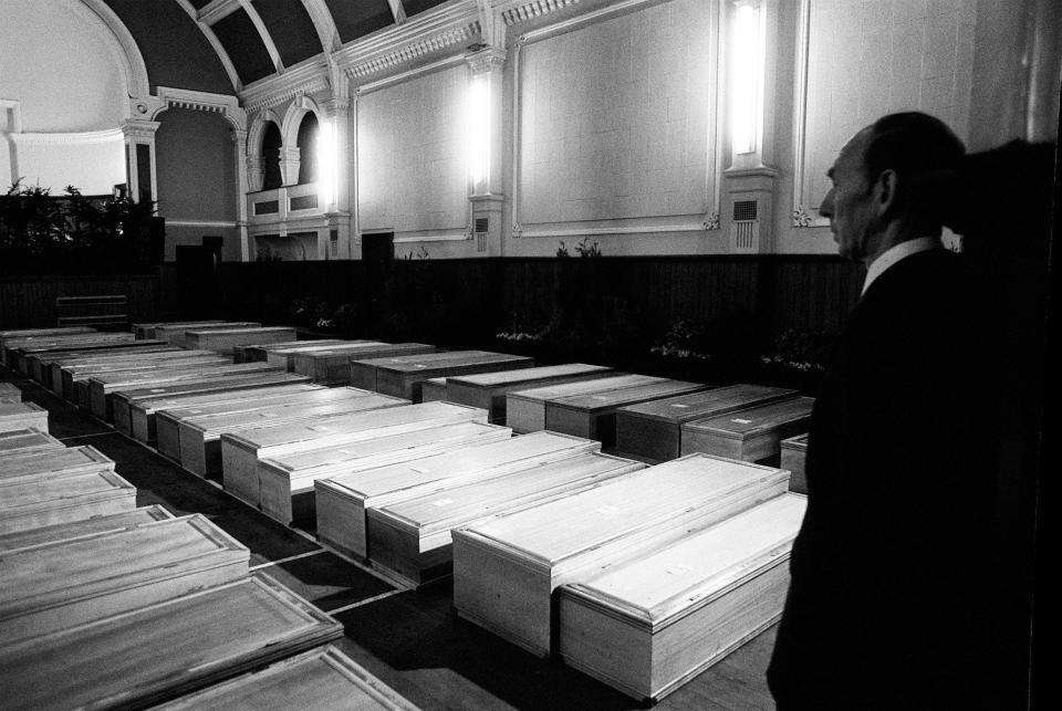  The rows of coffins of the dead were lined up in a makeshift chapel of rest in Lockerbie's town hall