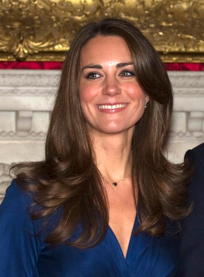  Kate with Prince William pictured soon after announcing their engagement in 2010