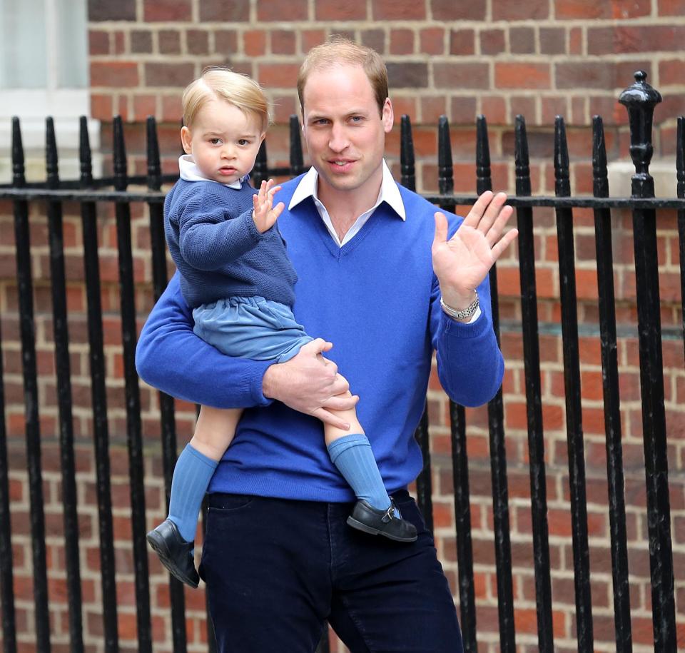  Wearing a matching jumper and shirt combo with his dad outside the Lindo Wing