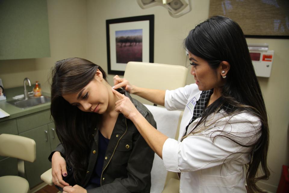  The US dermatologist, seen popping a cyst on a patient's neck, has found global fame through her gross videos