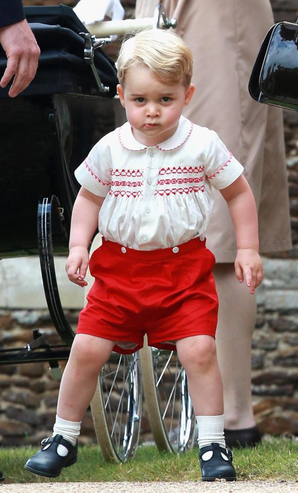  Prince George looked adorable in a pair of red shorts and a cute white shirt at Charlotte's christening