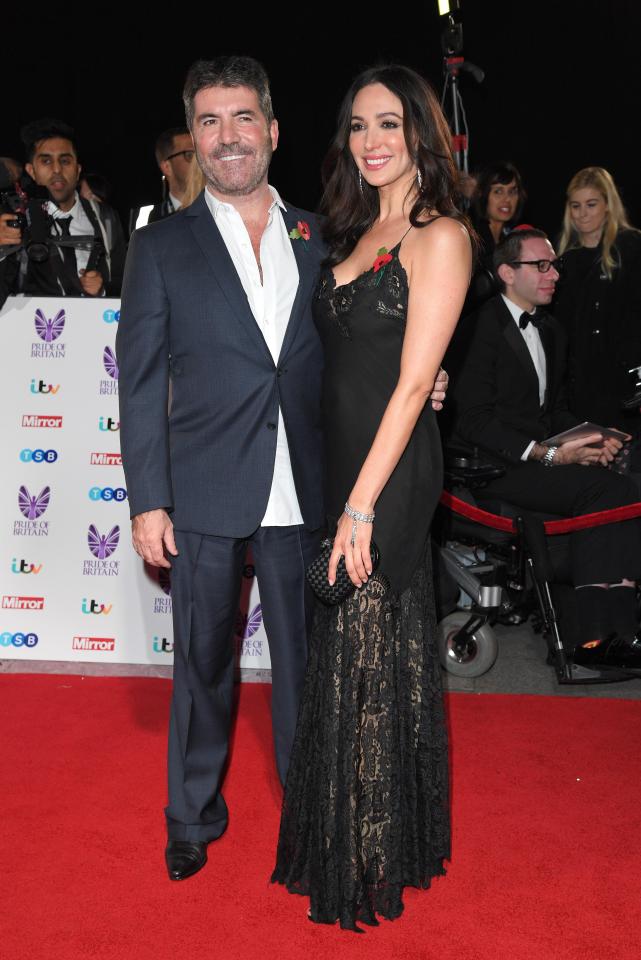  Lauren Silverman and Simon Cowell at a red carpet event