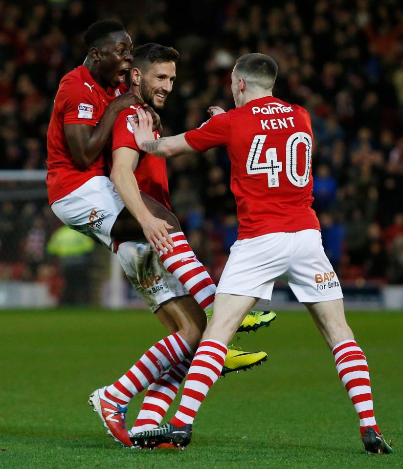  Andy Yiadom celebrates with his Barnsley team-mates