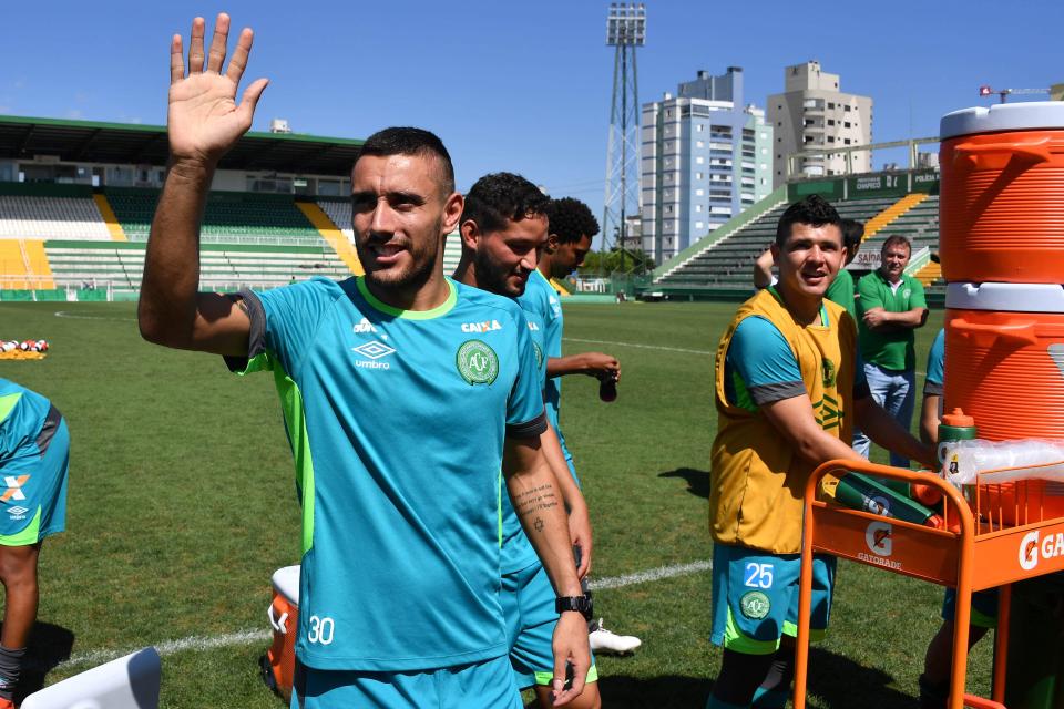  Ruschel waves at supporters during a training session at Arena Conda stadium