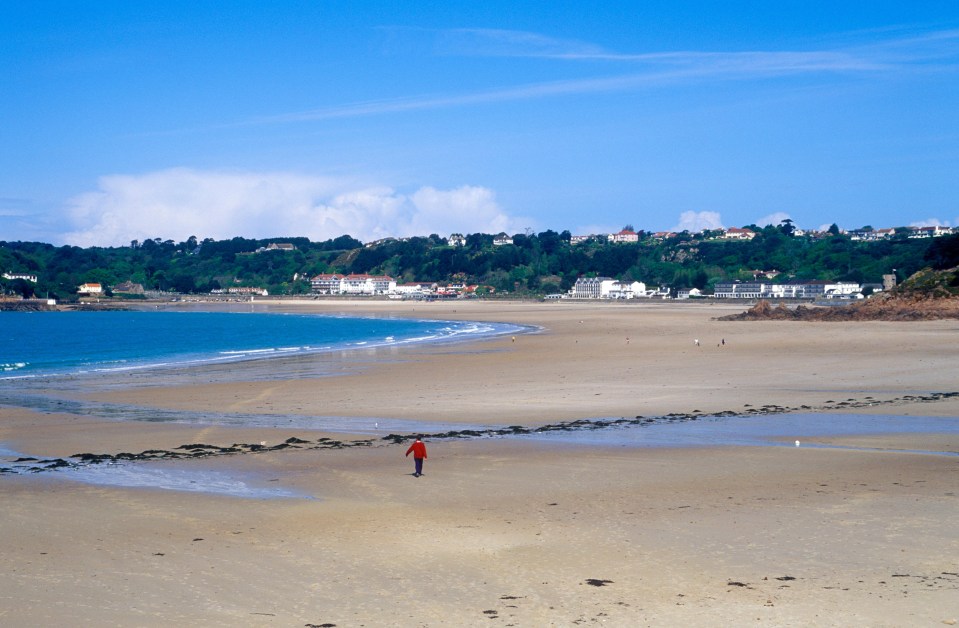 St Brelade’s Bay Beach, Jersey, offers trampolining and volleyball