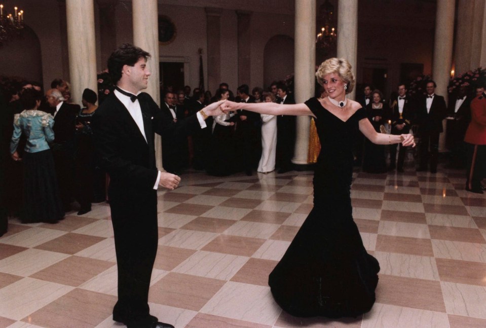 Princess Diana dances with John Travolta at a White House dinner in Washington