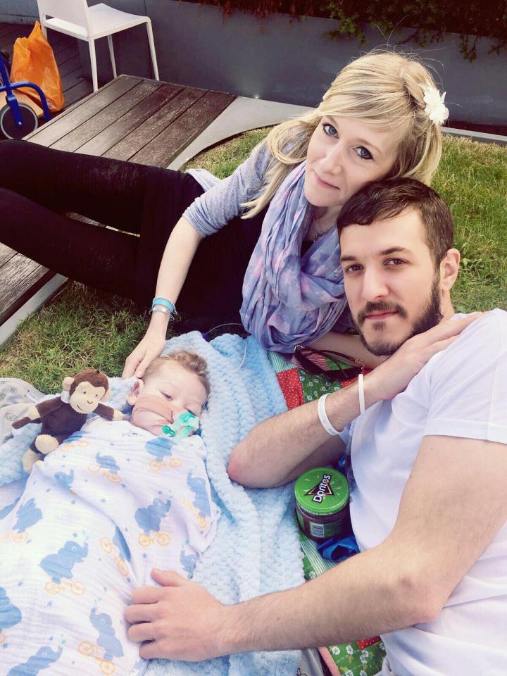  Connie Yates and Chris Gard having a family picnic with little Charlie