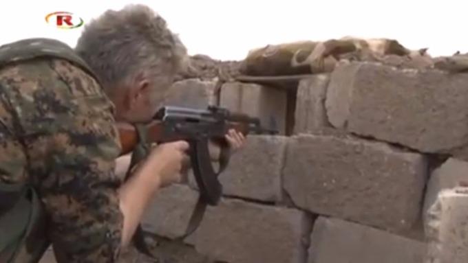 Michael taking aim in the bunker