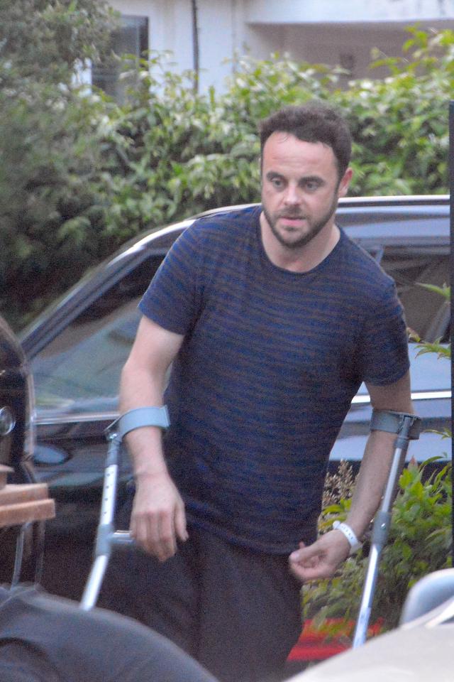  Ant McPartlin pictured on crutches following knee operation before he went into rehab