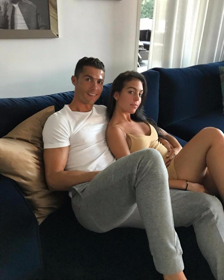  Cristiano Ronaldo and Georgina Rodriguez lie together on the couch