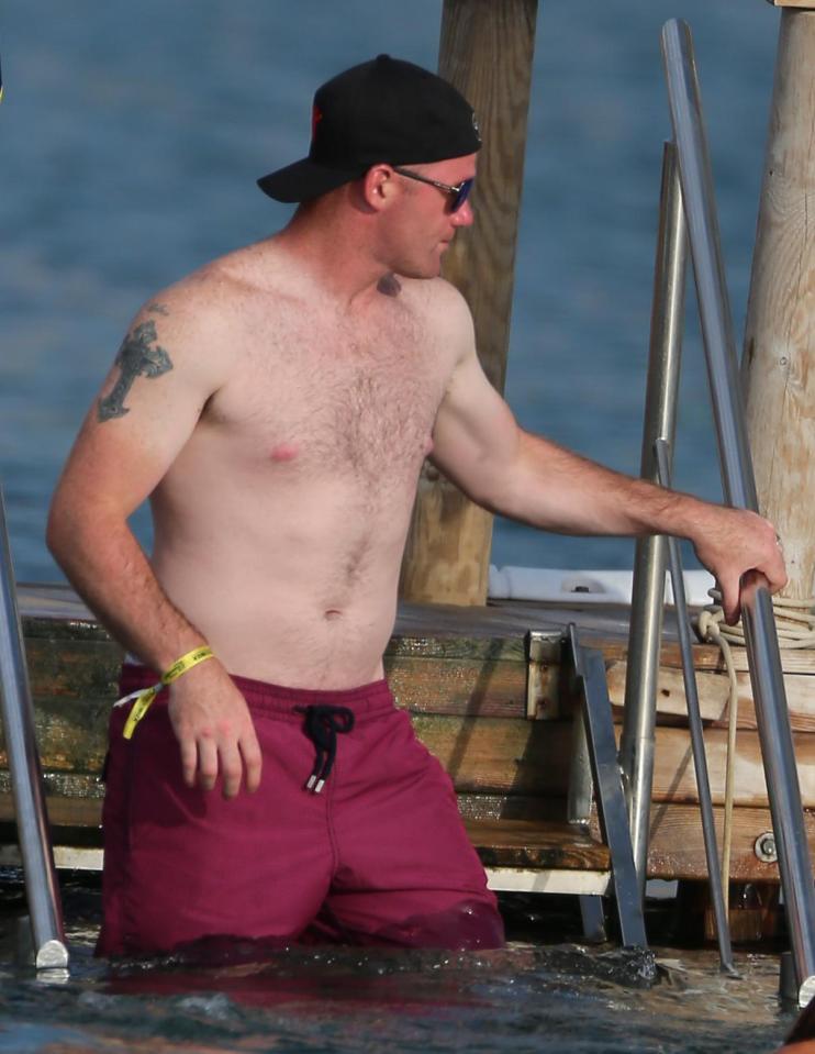  Wayne Rooney is enjoying a summer away from football, on holiday in Ibiza