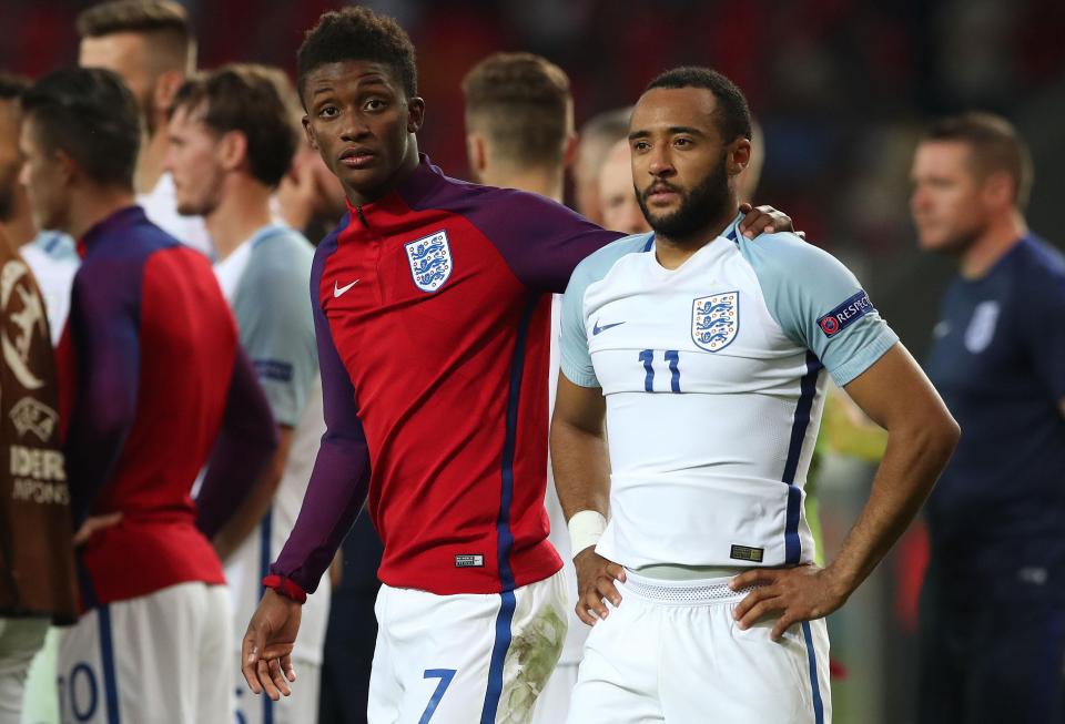  Demarai Gray comforts Nathan Redmond after England U21's are knocked out of the Euros by Germany.