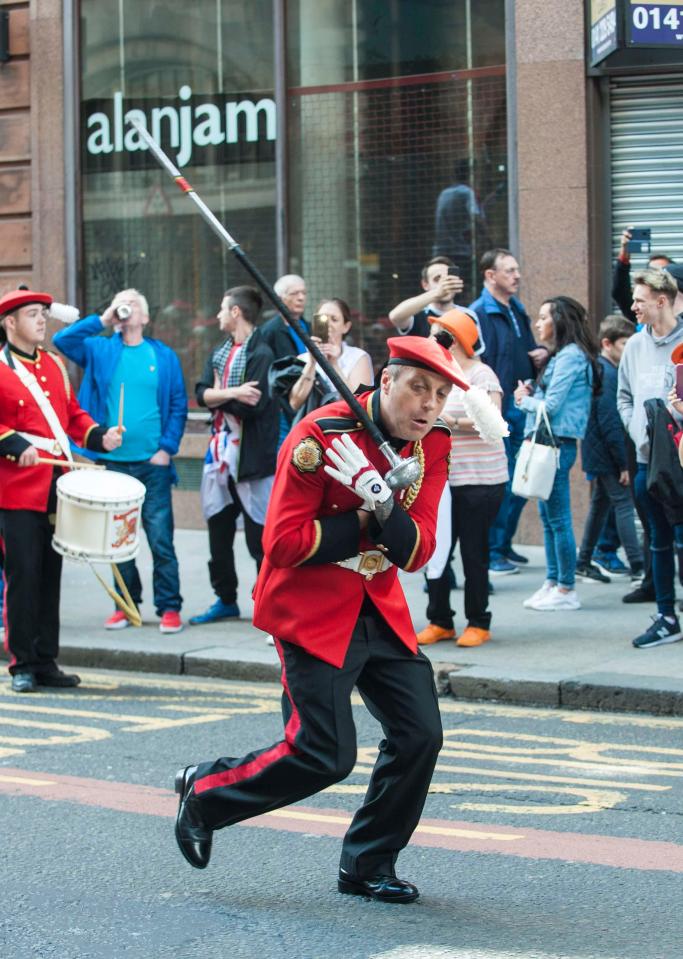  Marchers pictured performing at the well-attended event