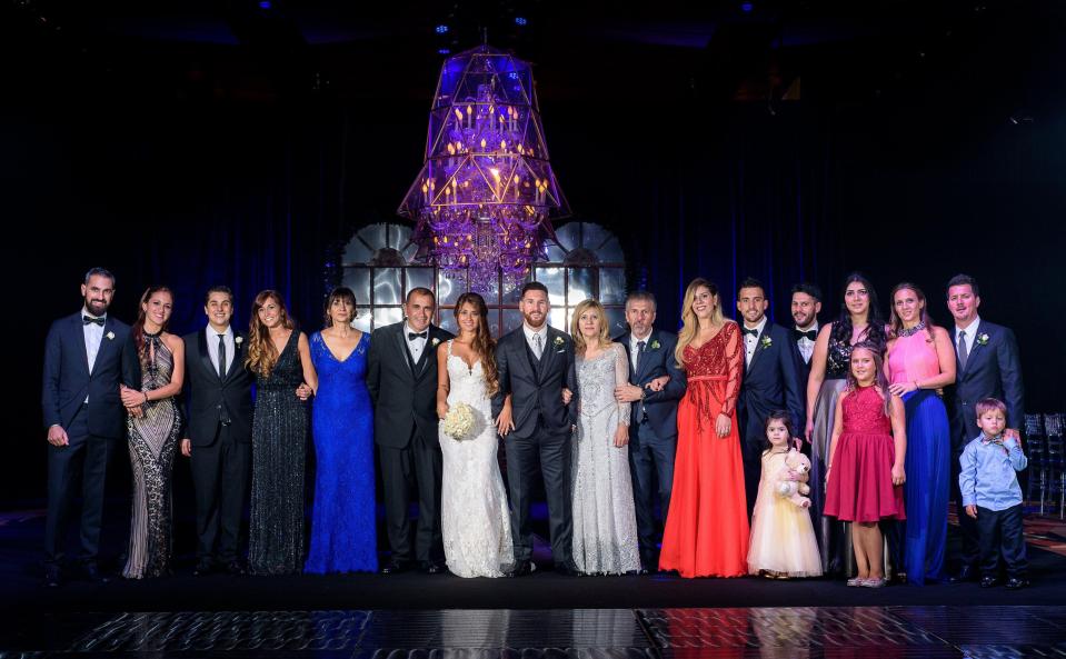  Several of the guests line up alongside Lionel Messi and Antonela Roccuzzo