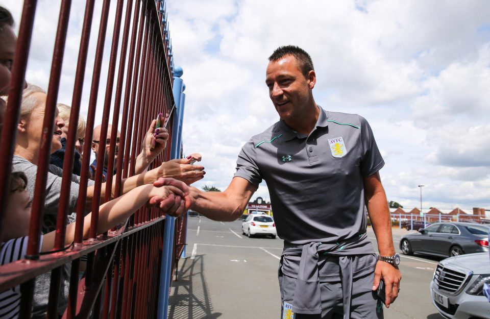  John Terry says hello to Aston Villa supporters following his summer move