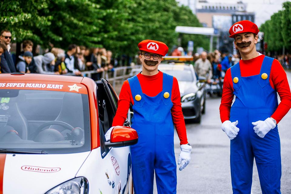  Some of the drivers, such as the Mario Brothers' pictured here, have a particularly colourful approach to the rally