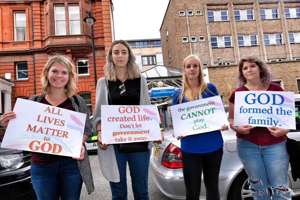  Members of the Hope and Anchor Community Church in Camden north London stand outside Great Ormand Street Hospital to offer hope to the family of baby Charlie Gard