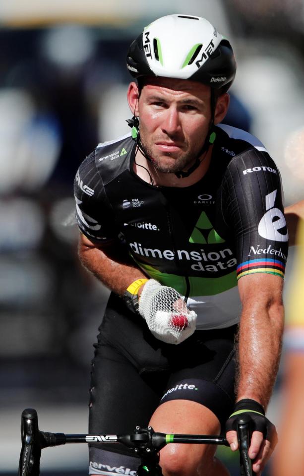  Mark Cavendish did manage to pick himself up after medical attention and crossed the finish line on his bike, bandaged and bloodied