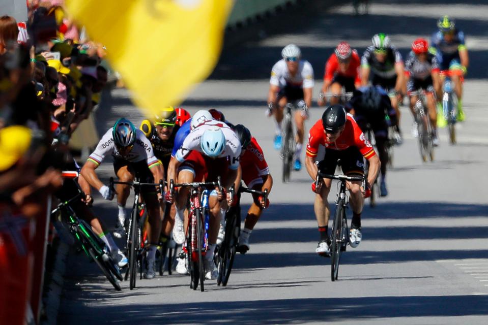  Peter Sagan appeared to throw out an elbow as Mark Cavendish crashed against the advertising hoarding