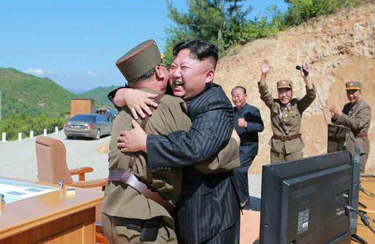  Kim Jong-un was pictured celebrating his latest weapons launch