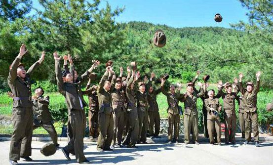 Troops celebrate as the missile heads towards its target