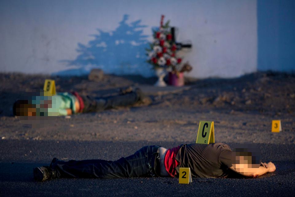  Bodies lie in the street in Navolato, Sinaloa state, Mexico, on June 29