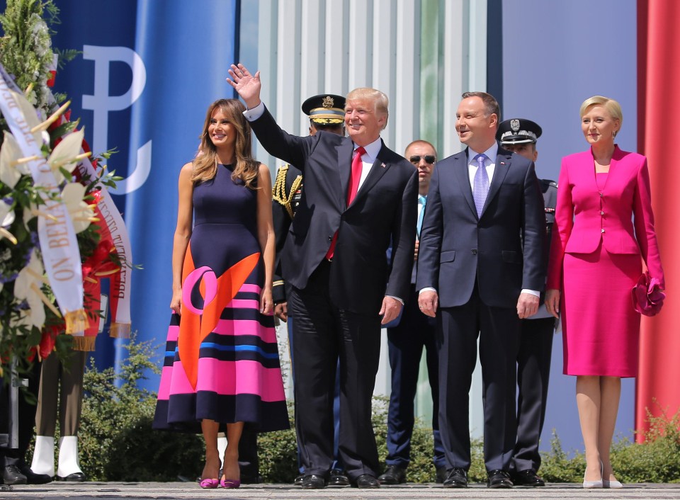 Donald Trump waves next to First Lady of the U.S. Melania Trump, Polish President Andrzej Duda and First Lady of Poland Agata Kornhauser-Duda before his public speech at Krasinski Square, in Warsaw