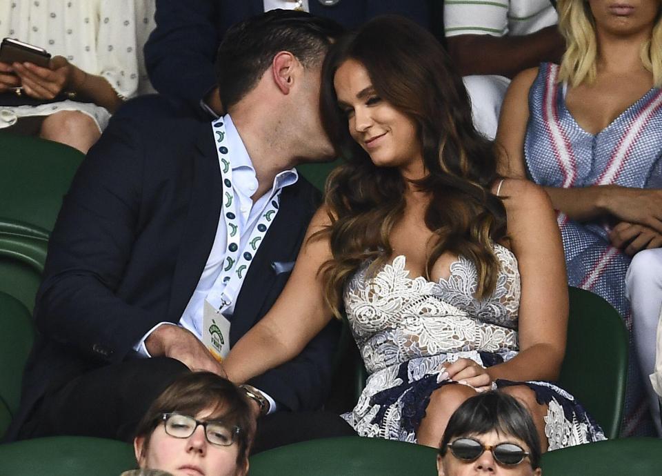  The pair couldn't keep their hands off one another in the stands