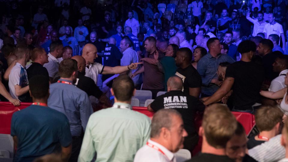 A sickening fight broke out at ringside during the bout at the Copper Box Arena