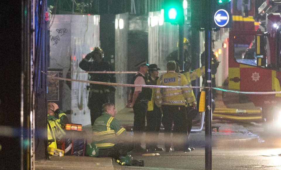  Emergency workers taking a break during the incident in which no one was killed