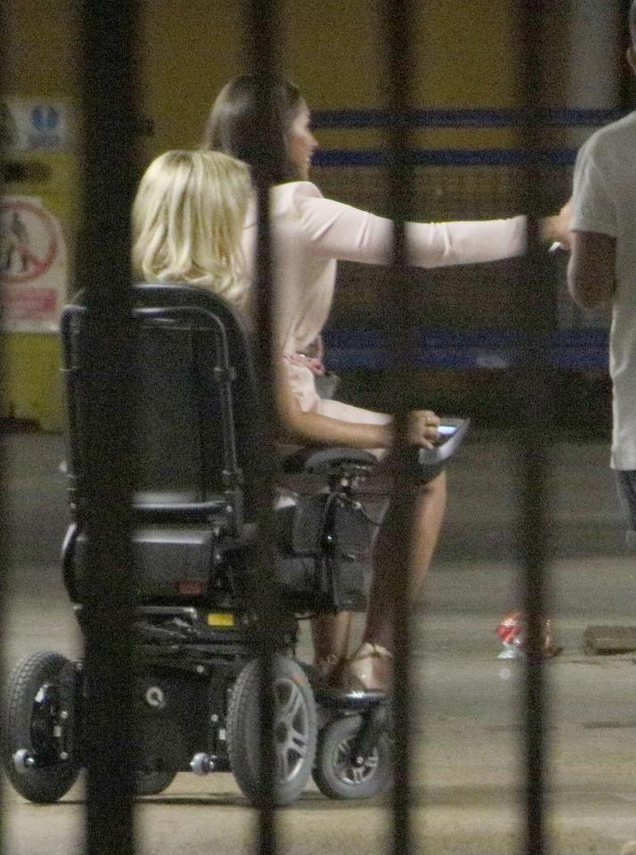  The girls rode around on a motorised wheelchair in the studio lot