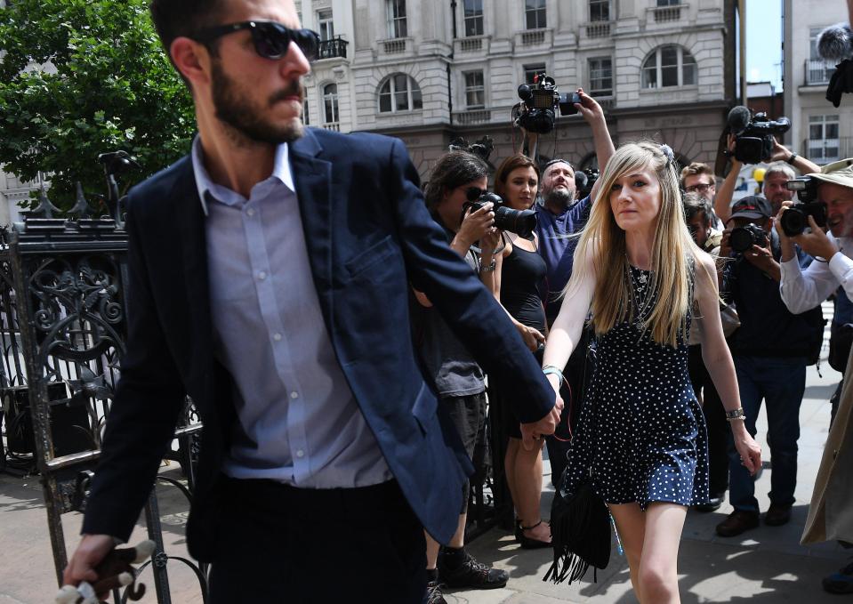  Chris Gard and Connie Yates held hands as they arrived at the High Court for a preliminary hearing on July 10