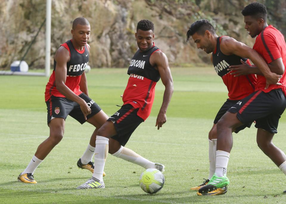  Arsene Wenger wants to make an improved offer of £80MILLION for Monaco star Thomas Lemar (centre)