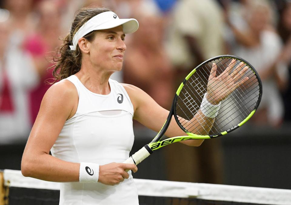  Jo Konta applauds the Centre Court crowd after her quarter-final victory over Simona Halep