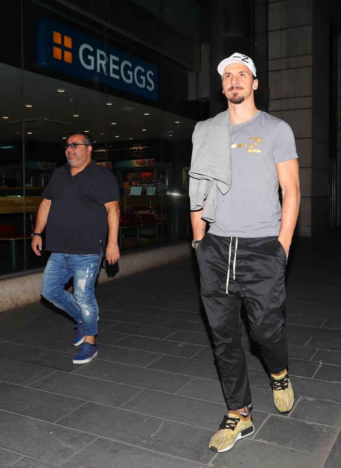  Zlatan Ibrahimovic and Mino Raiola are spotted walking outside a Greggs shop in Manchester