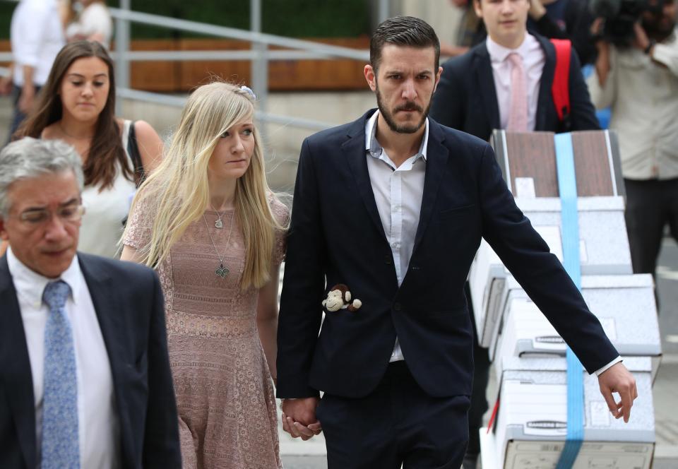  Charlie's mum and dad Connie and Chris arrive at court this morning with Charlie's toy monkey in his pocket