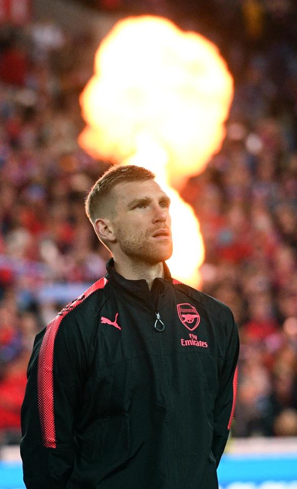  Per Mertesacker was forced to pull out of the win against Bayern Munich with illness