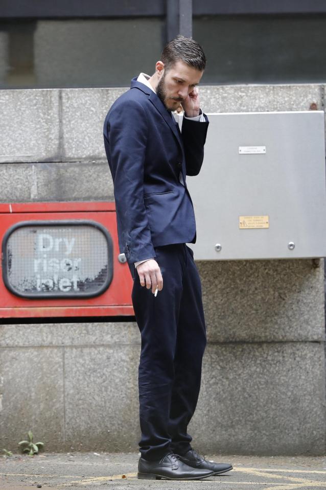  Charlie's dad Chris has a cigarette outside the court after storming out following a heated row with the judge