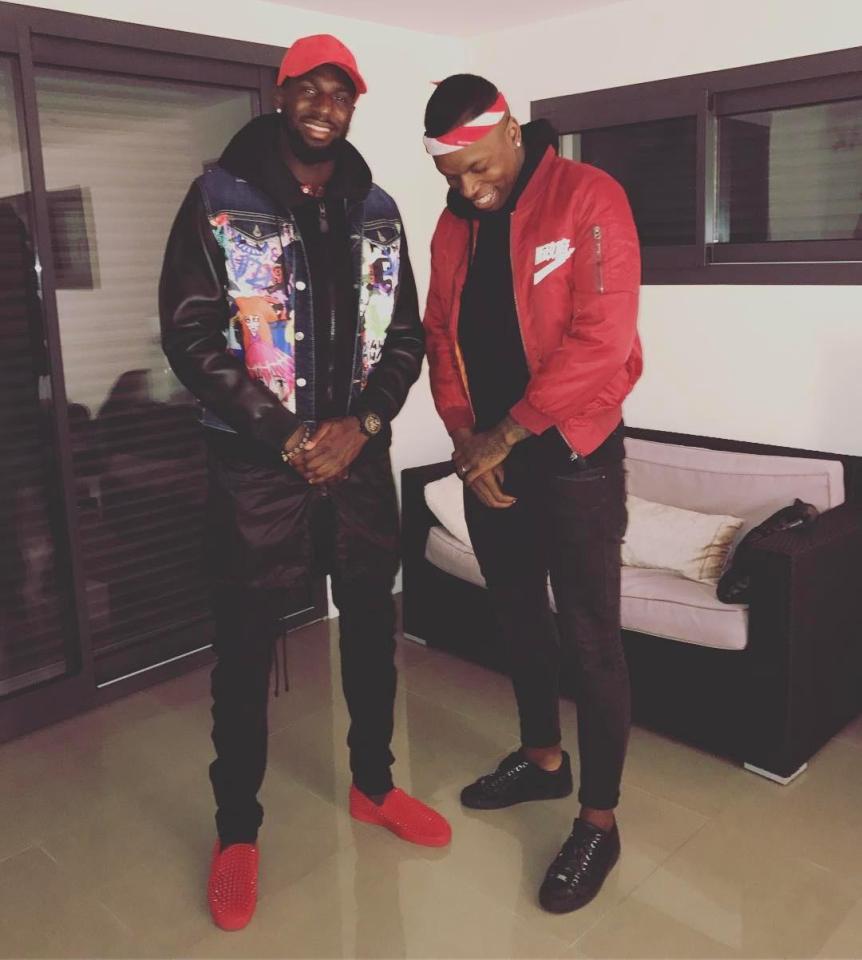  Tiemoue Bakayoko, left, still has a flamboyant dress sense judging by his red shoes and colourful jacket, in this Instagram post with a pal