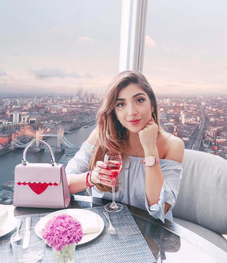  Londoner Amelia treats herself to a rose at The Shard