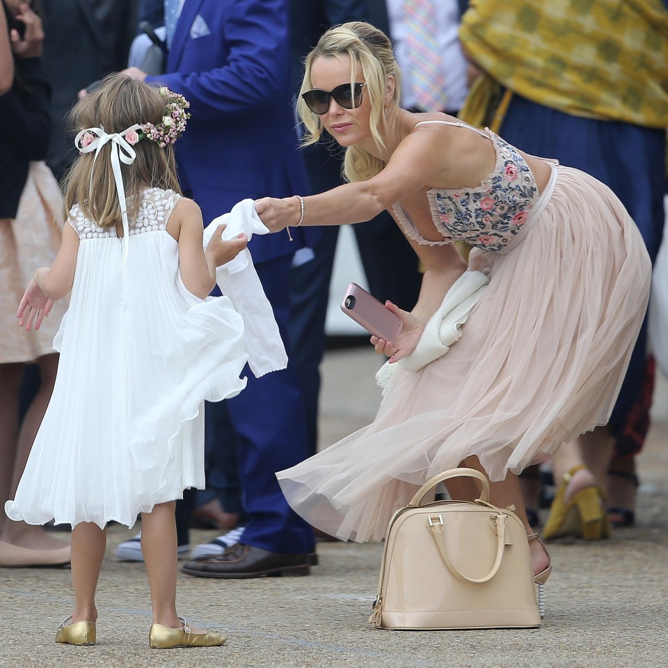 Daughter Alexa, 11, was a bridesmaid and her five-year-old sister Hollie a flower girl