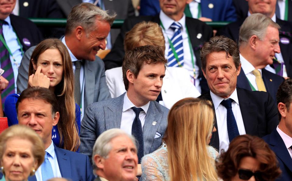  Eddie Redmayne and Hugh Grant sat together for the match on Sunday afternoon