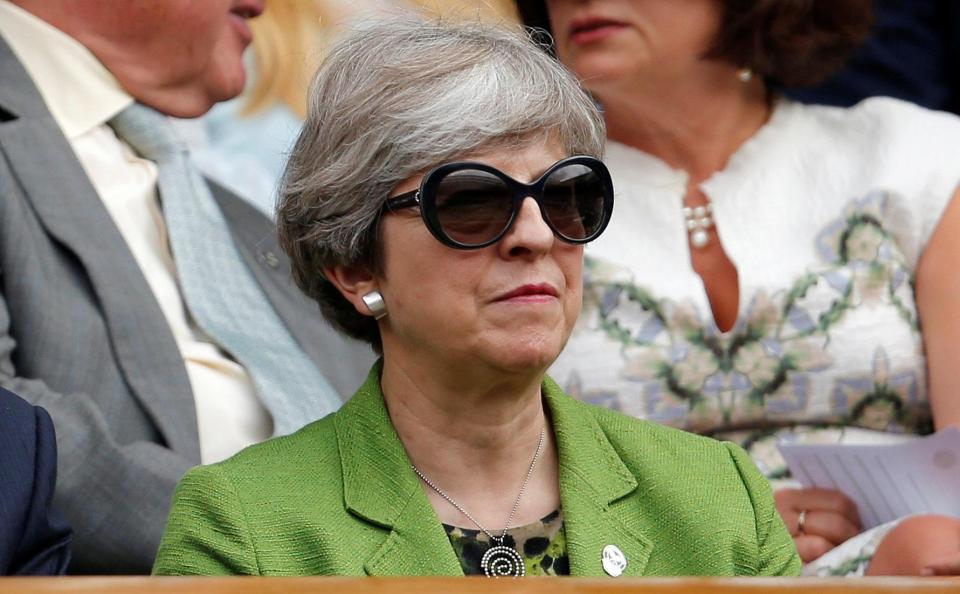  The Prime Minister Theresa May donned a pair of dark sunglasses for Wimbledon today