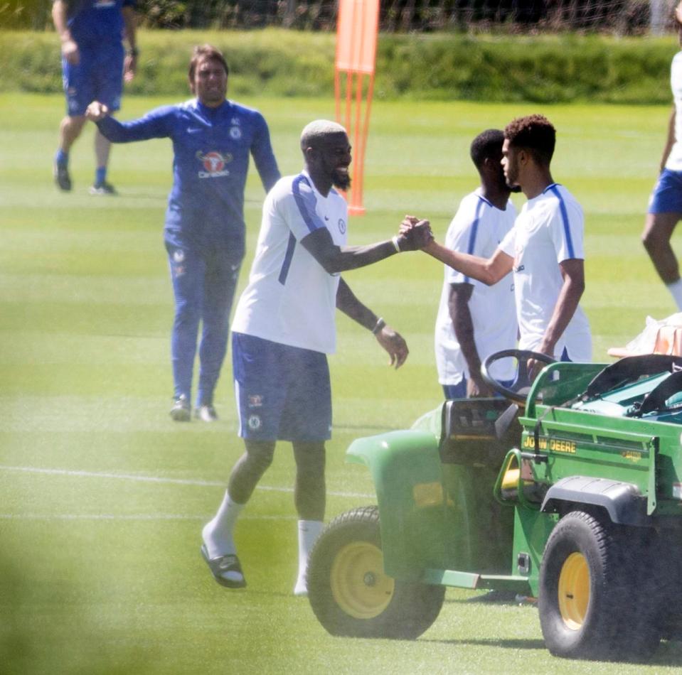  Bakayoko, wearing flip-flops, meets Jack Clarke-Salter in the session as he recovers from injury