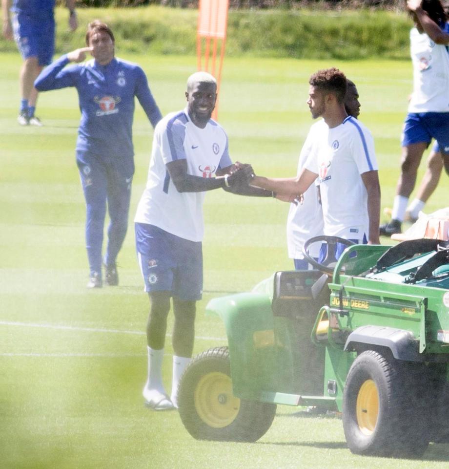  Tiemoue Bakayoko smiles as he greets his new team-mates