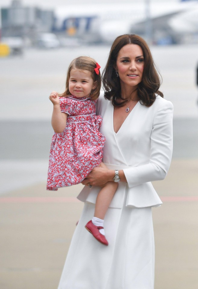 Kate with Charlotte who wore a pink floral dress