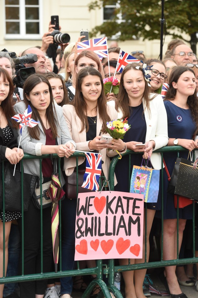  Fans of the young royals lined the streets in Warsaw with Union Jack flags