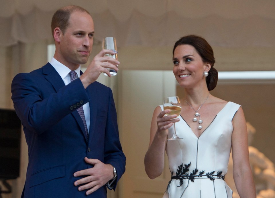 The couple looked happy while enjoying wine at a party