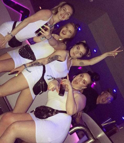  Girls make memories in matching white for Instagram photos