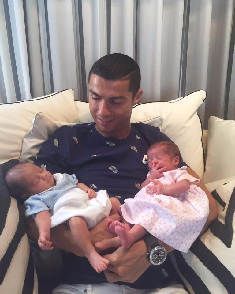  Real Madrid superstar Cristiano Ronaldo lovingly holds Eva and Mateo